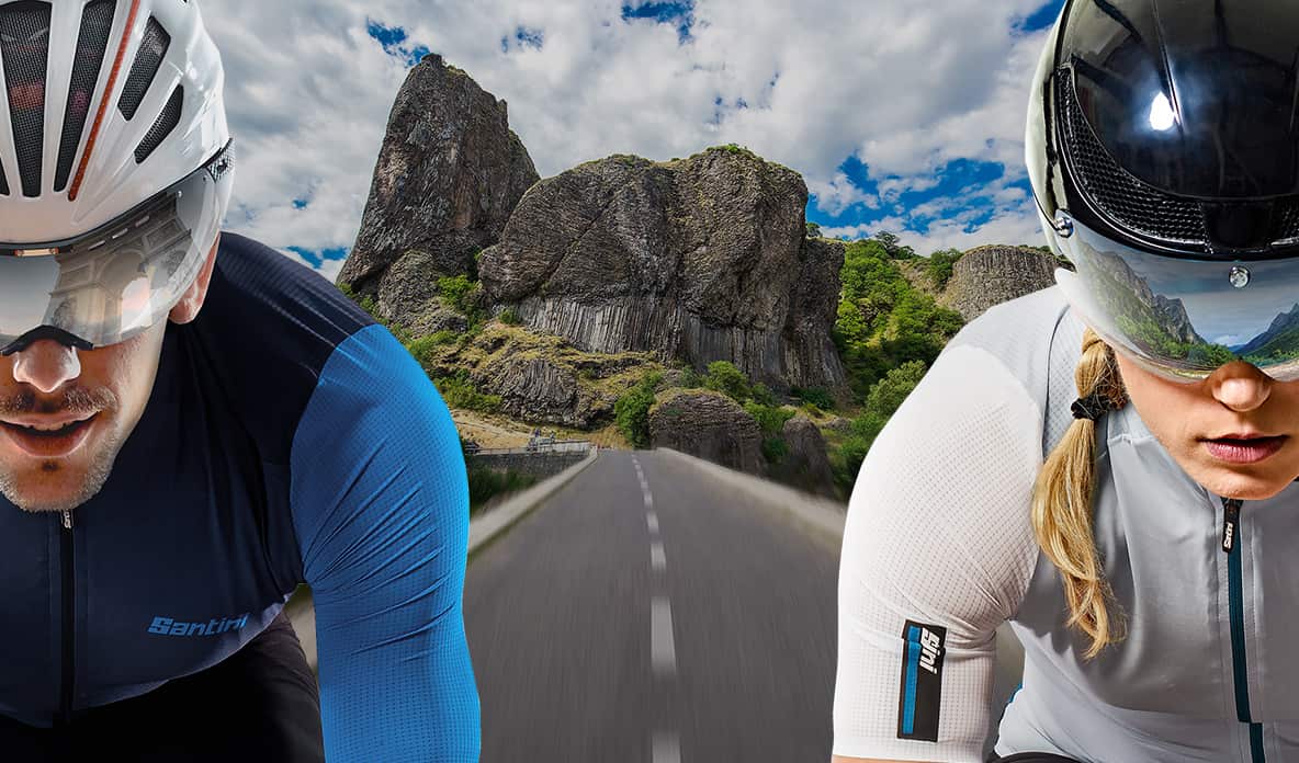 A man and a woman cycle outdoors, appearing as though they are riding side by side.jpg