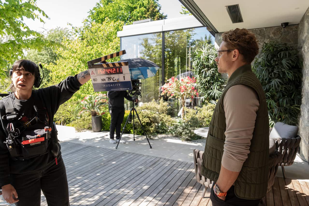 Billy Magnussen as Duncan filming a scene in a behind-the-scenes look at the making of 'The Audacity'.