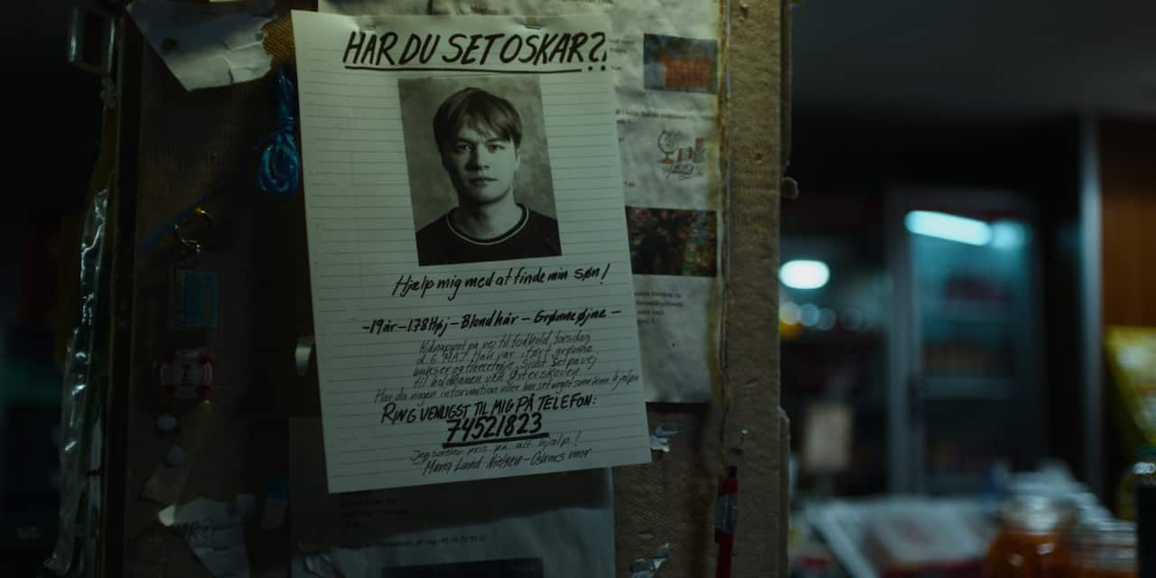 A "have you seen this person" sign featuring a young man on a telegraph pole