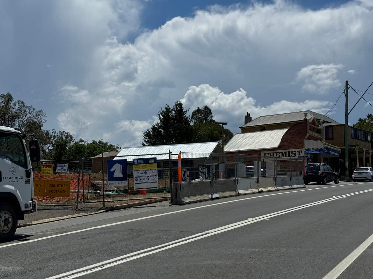 A construction site alongside a road.