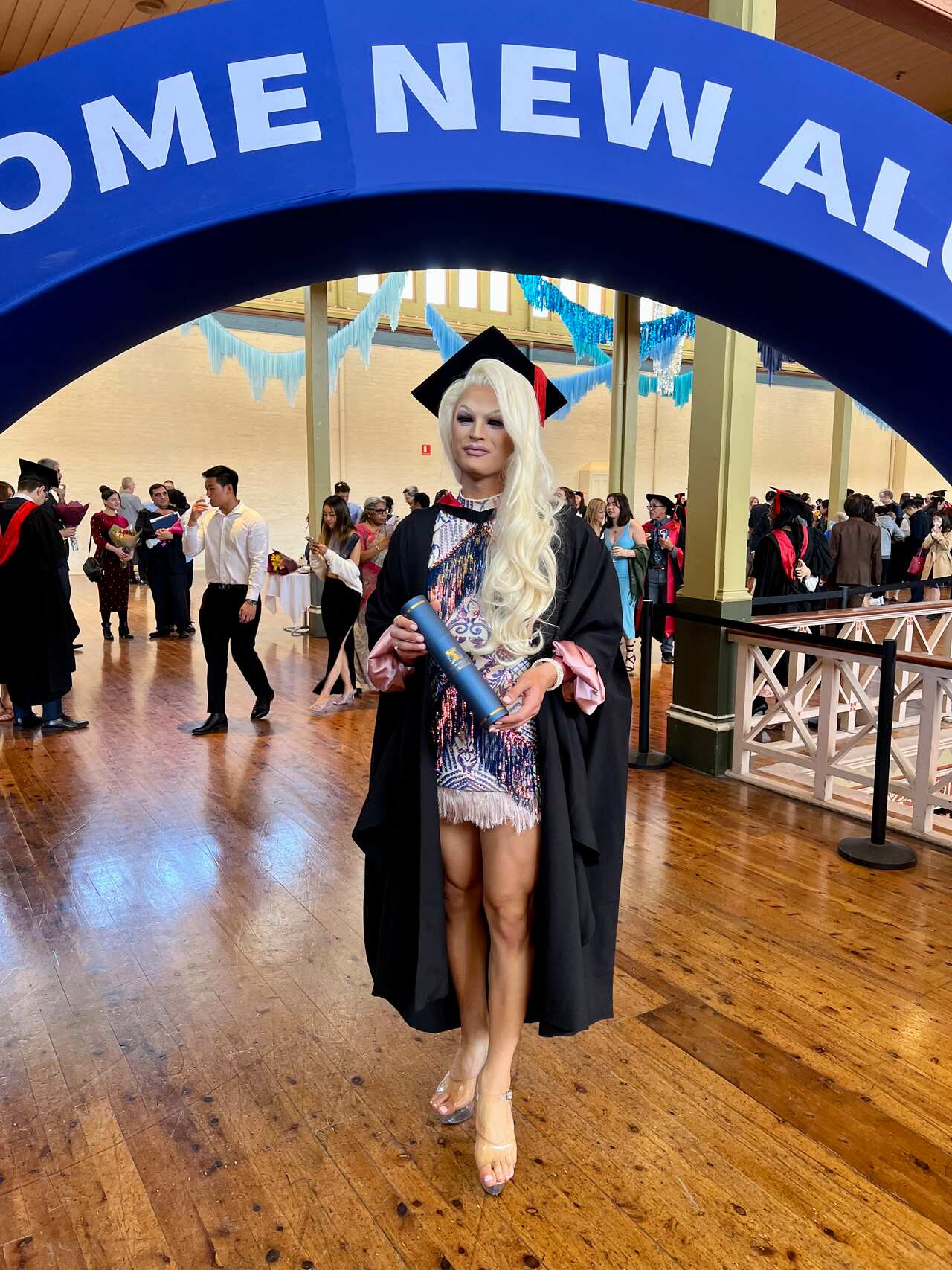 A drag queen with a diploma