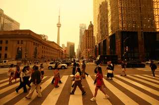 A crosswalk shrouded in orange haze