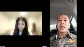 A Thai woman and a Thai man in police uniform speak on mobile phone cameras.