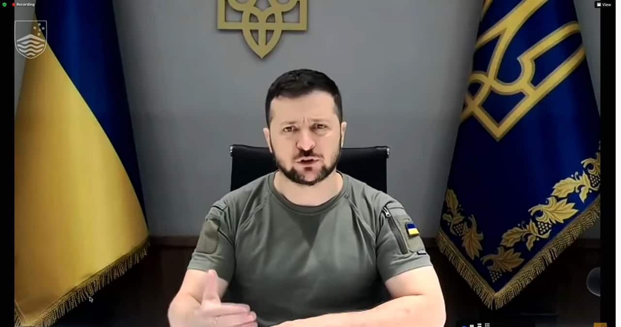 Ukrainian President Volodymyr Zelenskyy addresses students from 20 Australian universities via Zoom video. 