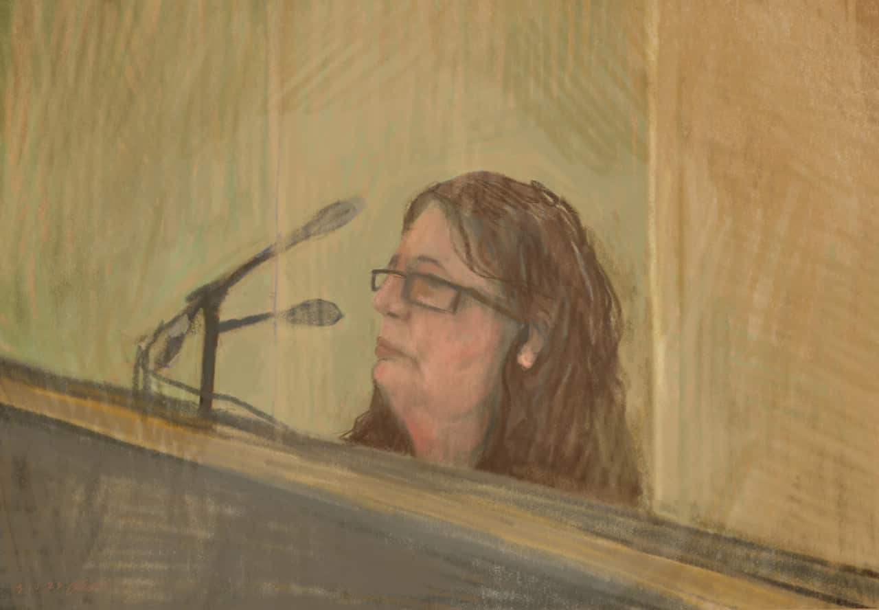 A drawing of a woman appearing in court