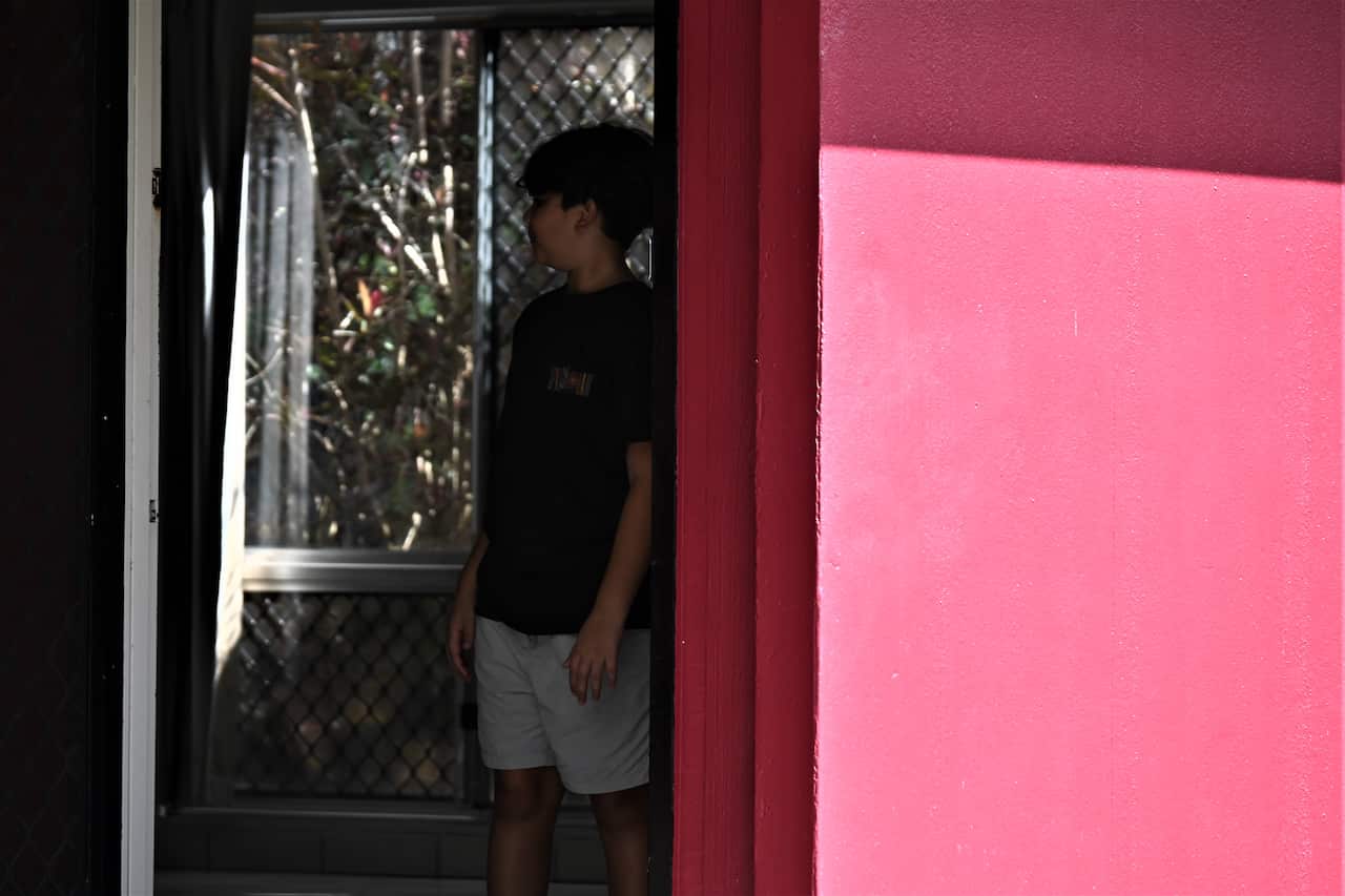 Bradley Liddle looks through his new home