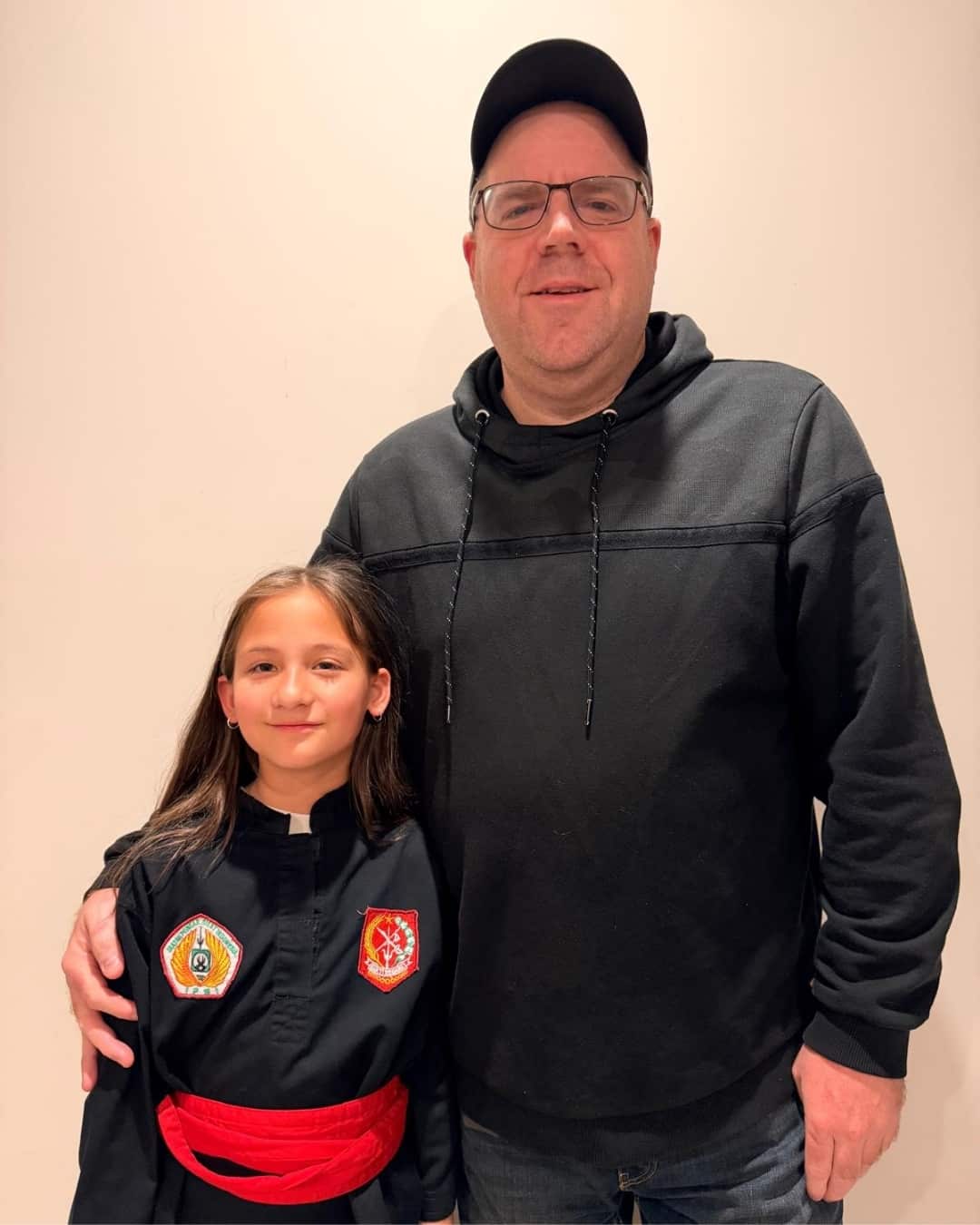 Kaila Lloyd with her dad Simon Lloyd after winning the Best Female Fighter award at the 2026 Victorian Pencak Silat Championship.
