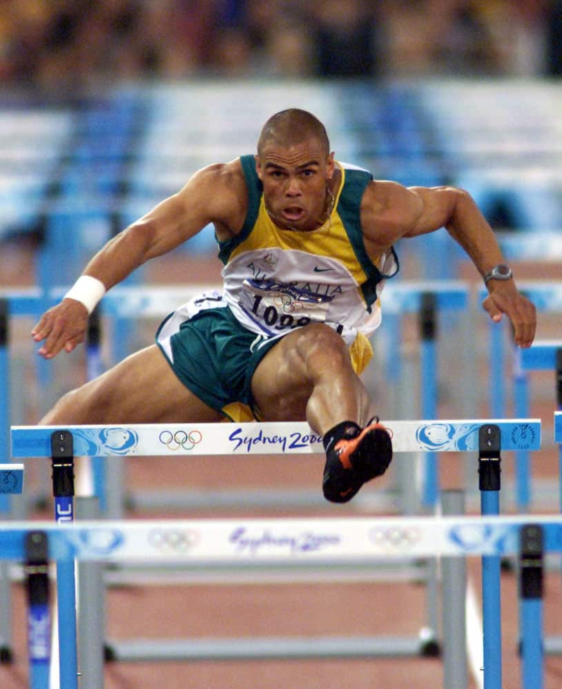 Kyle Vander-Kuyp competing in the hurdles at the Sydney 2000 Olympics – image supplied by Kyle Vander-Kuyp