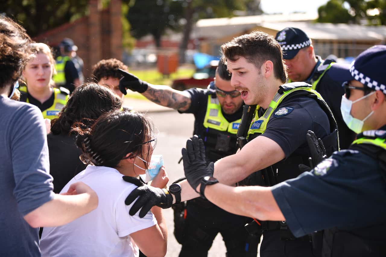Protesters scuffle with Victoria Police officers 