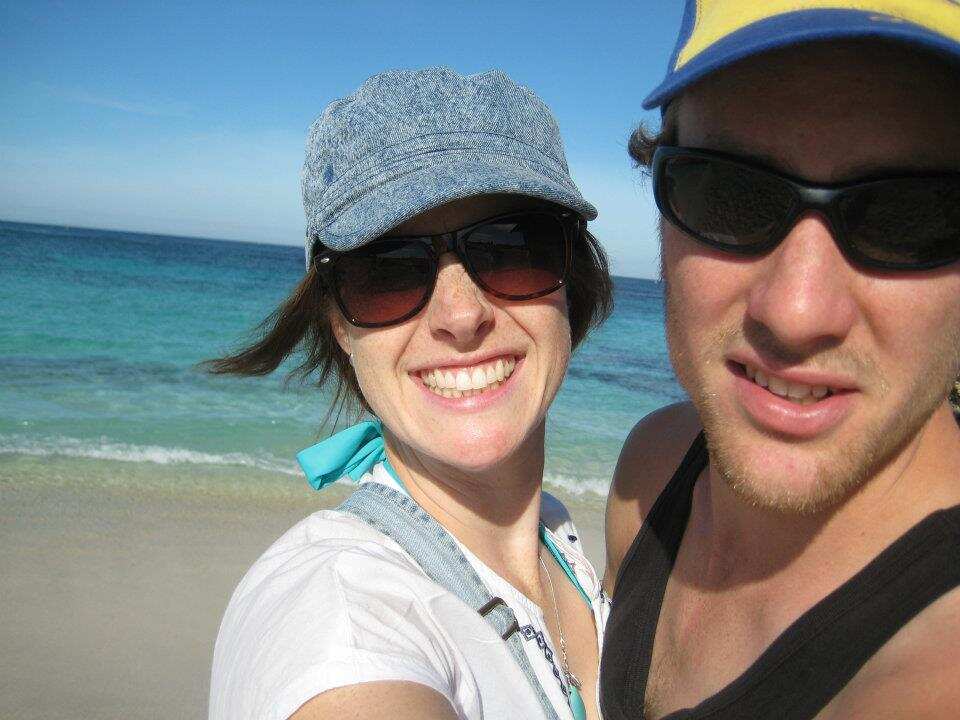 Sarah Rus smiles with former boyfriend Andy on a beach.