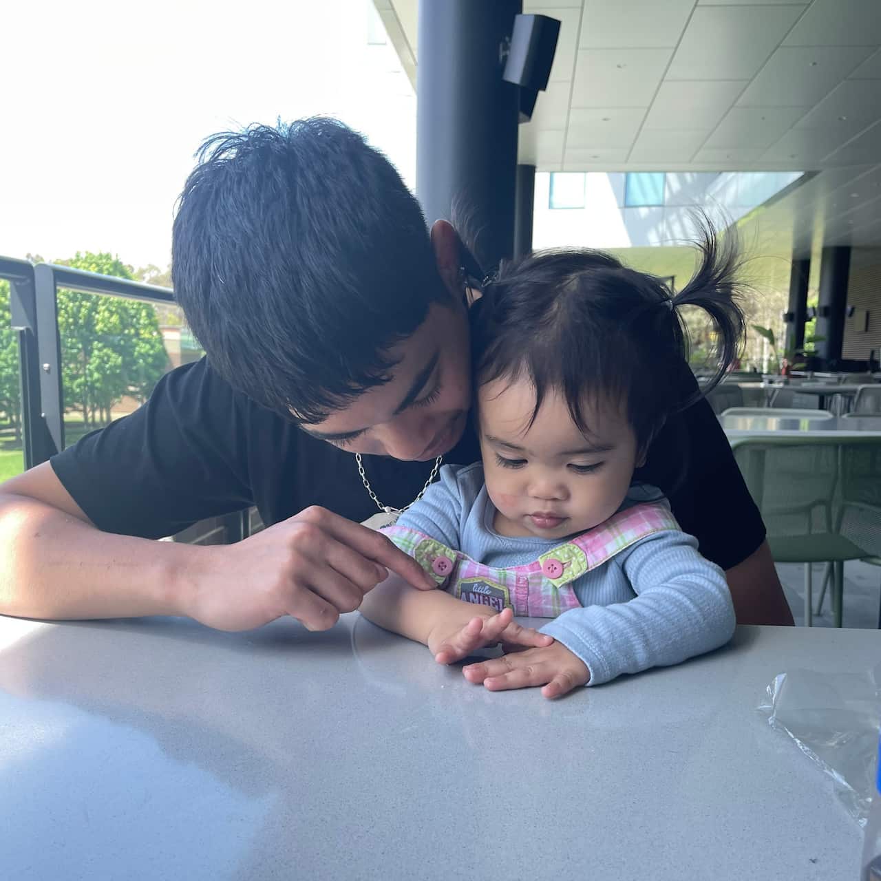 Vianne Biala's partner Kai with daughter Kira.