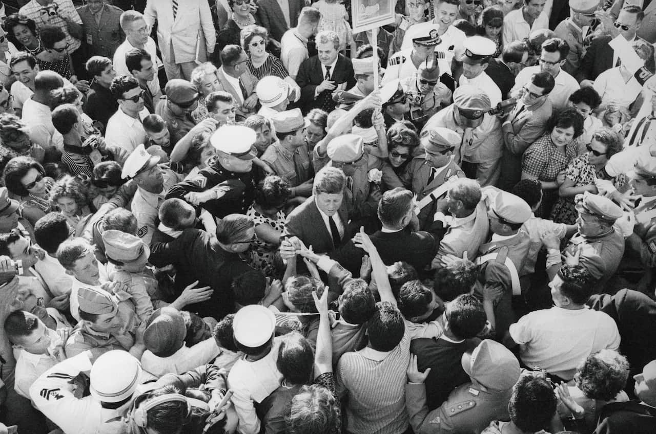 John Kennedy Surrounded by Italians