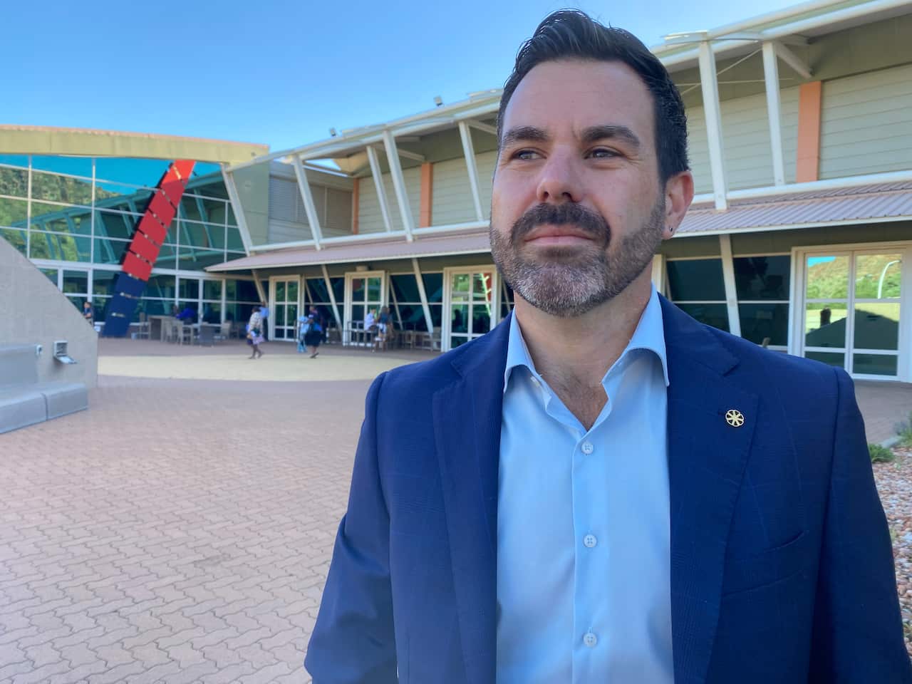 A man wearing a suit. 