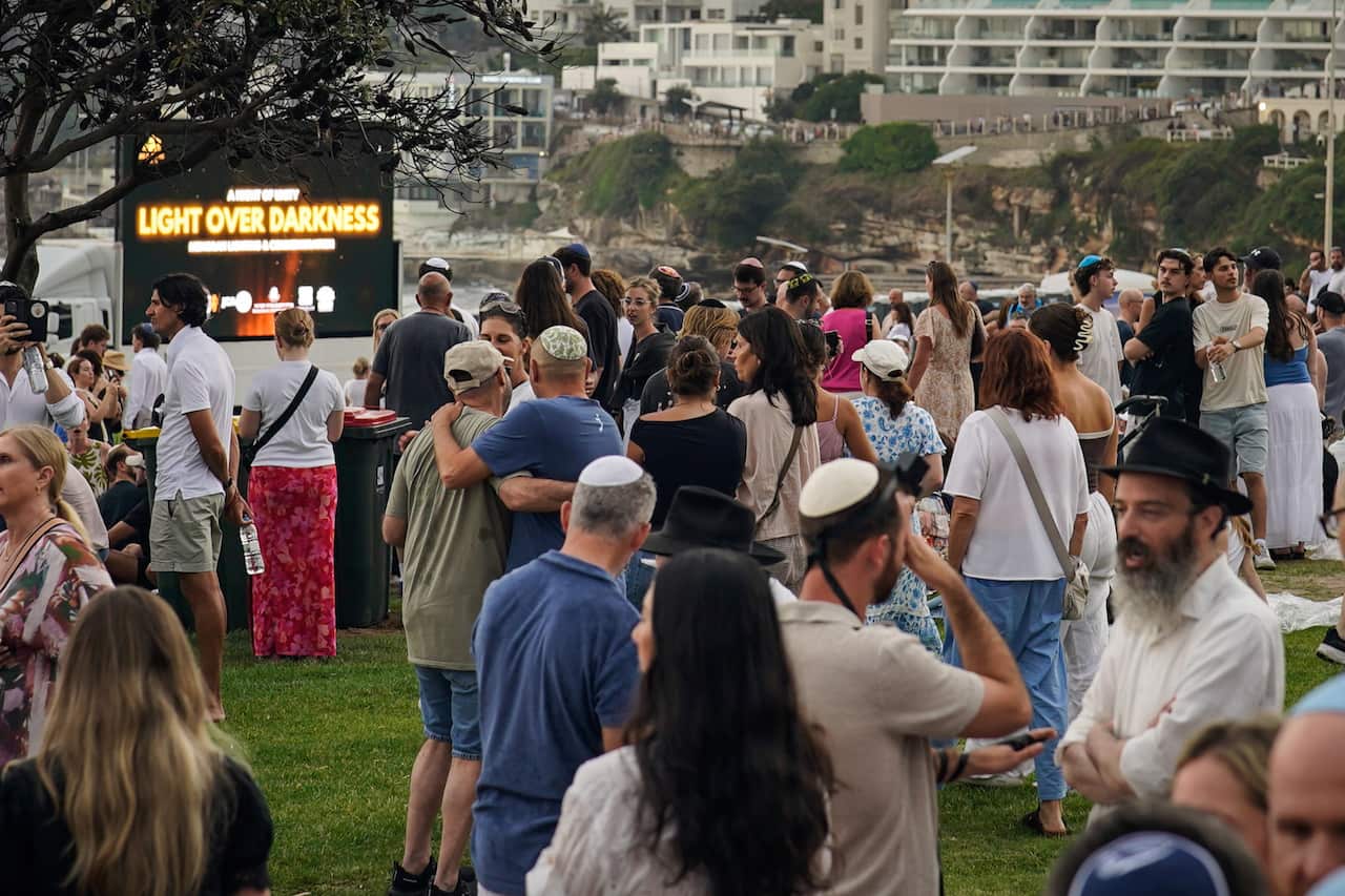 People Join Vigil In Remembrance Of Bondi Shooting Victims