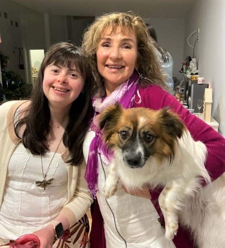 Miriam Philomena with her daughter and pet dog 