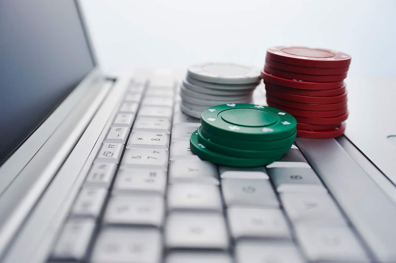 poker chips on a laptop