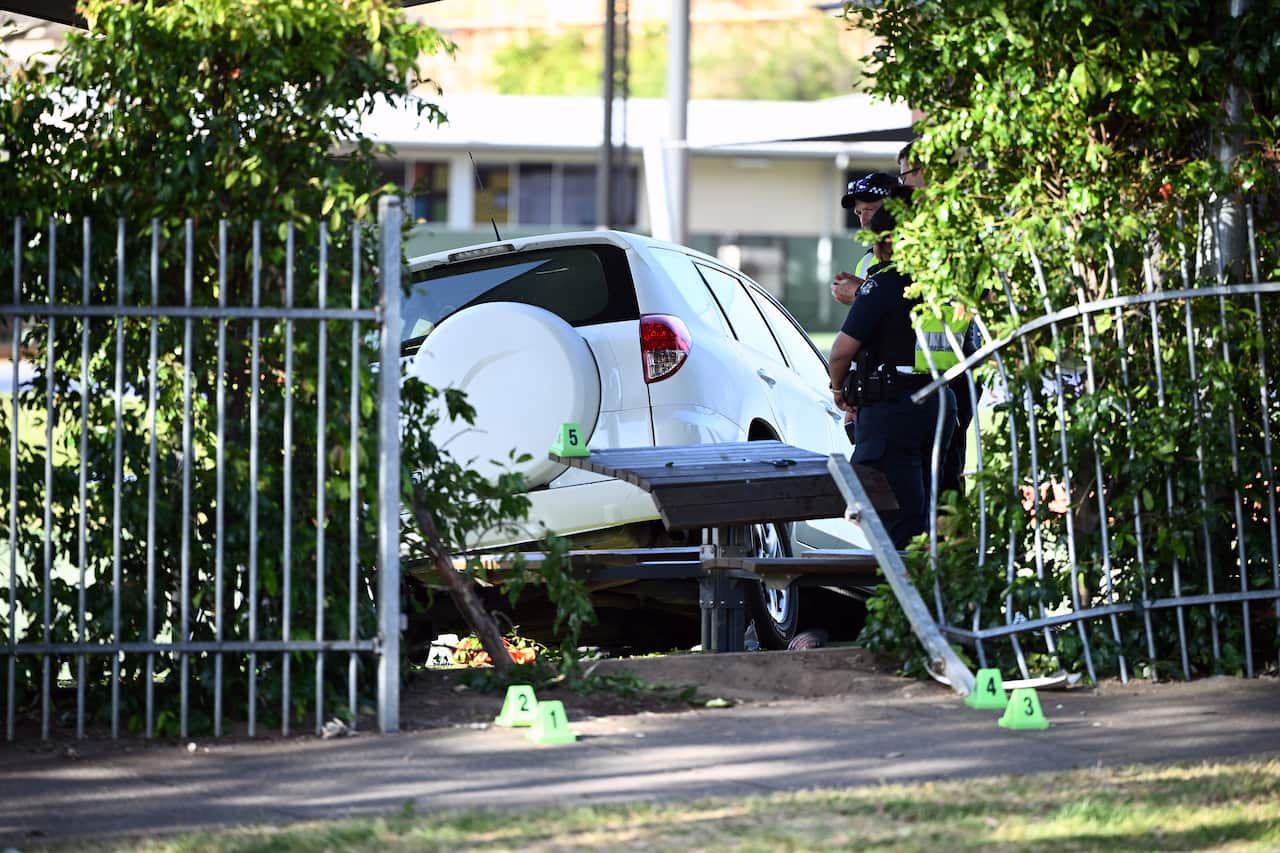 A car seen after going through a fence at Auburn South Primary School.