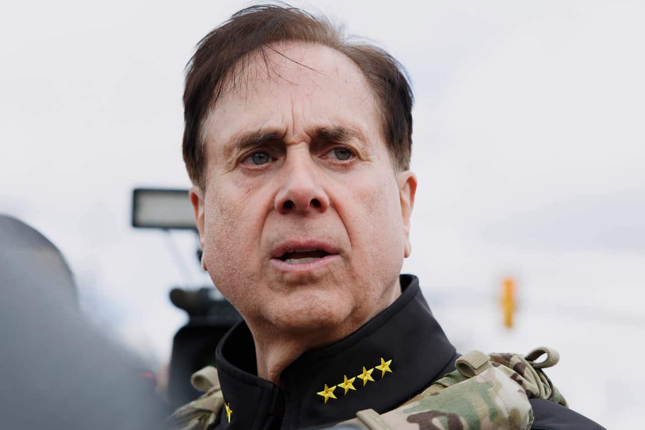 A man wearing military camo.