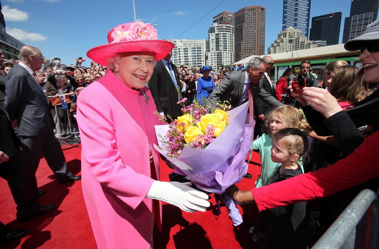 Queen Elizabeth II greets the public at Melbourne's Federation Square.