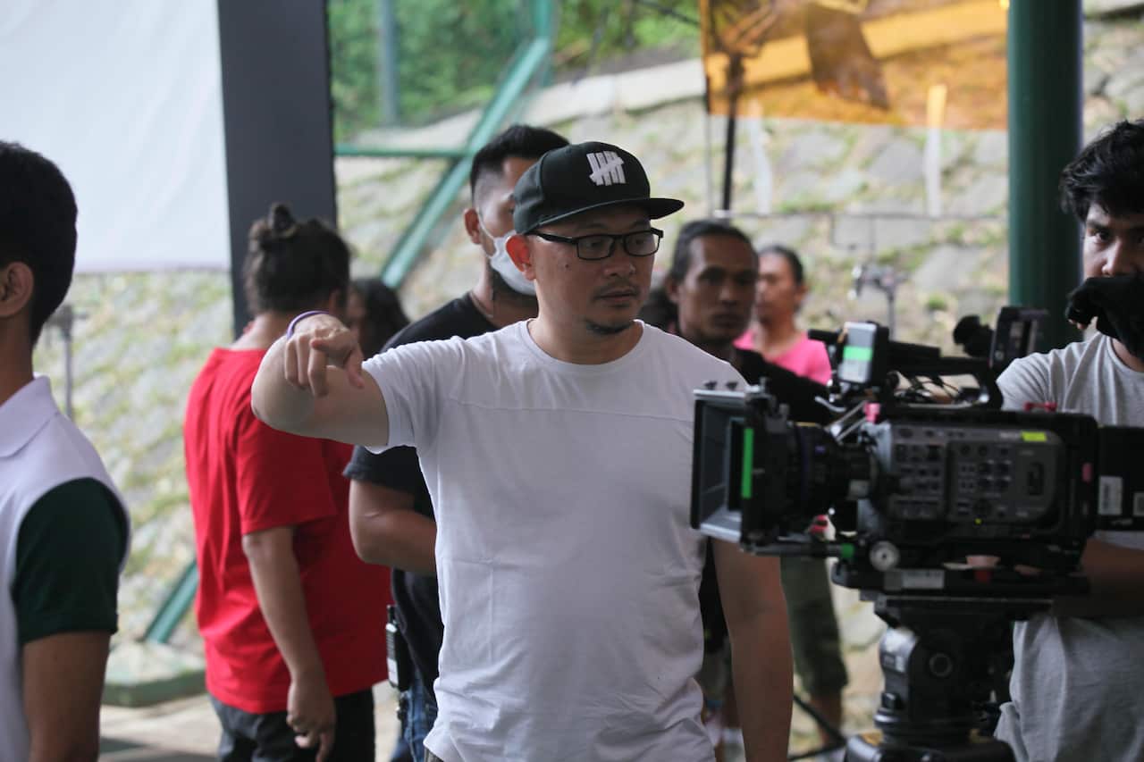 Verdi Sulaeman reviewing a scene during production.