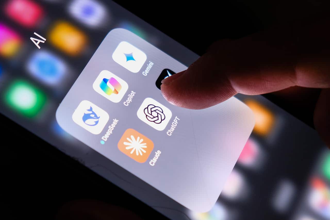 A folder on an iPhone labelled "AI", containing six apps including ChatGPT, Gemini and Claude