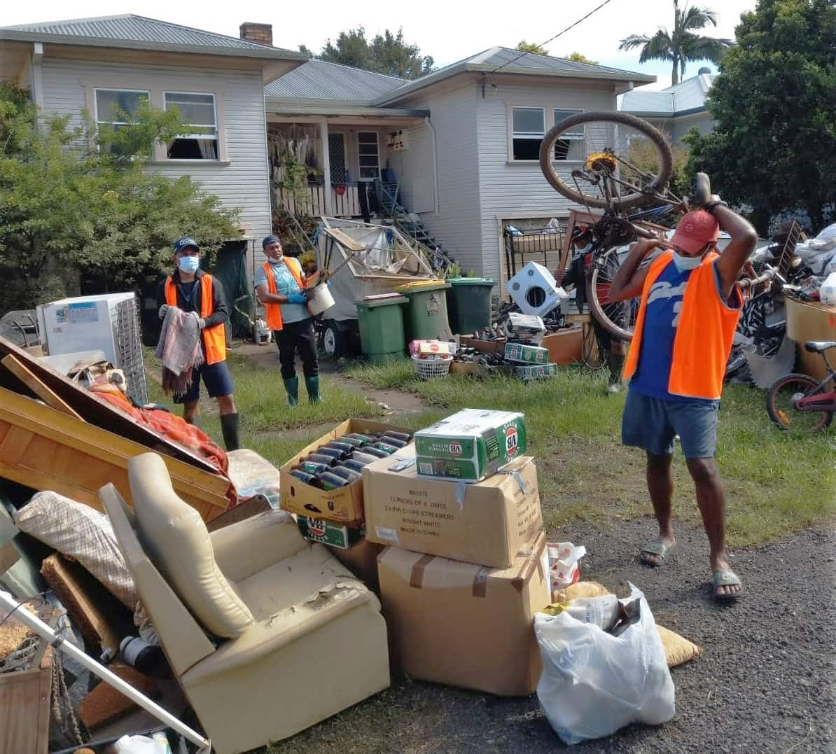 The team split up into groups to work efficiently, clearing out dozens of homes a day once the water subsided.
