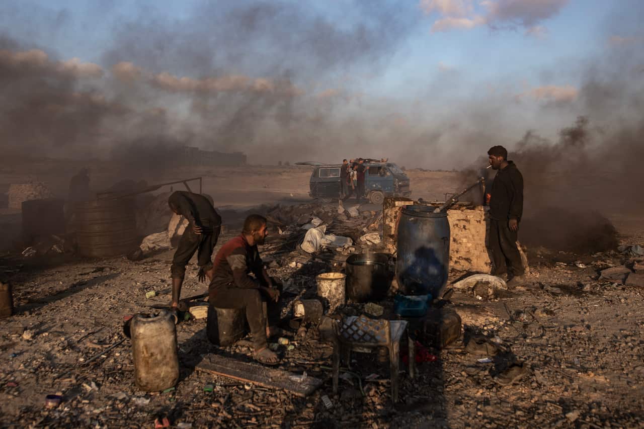 Palestinians gather to receive aid via Netzarim Corridor