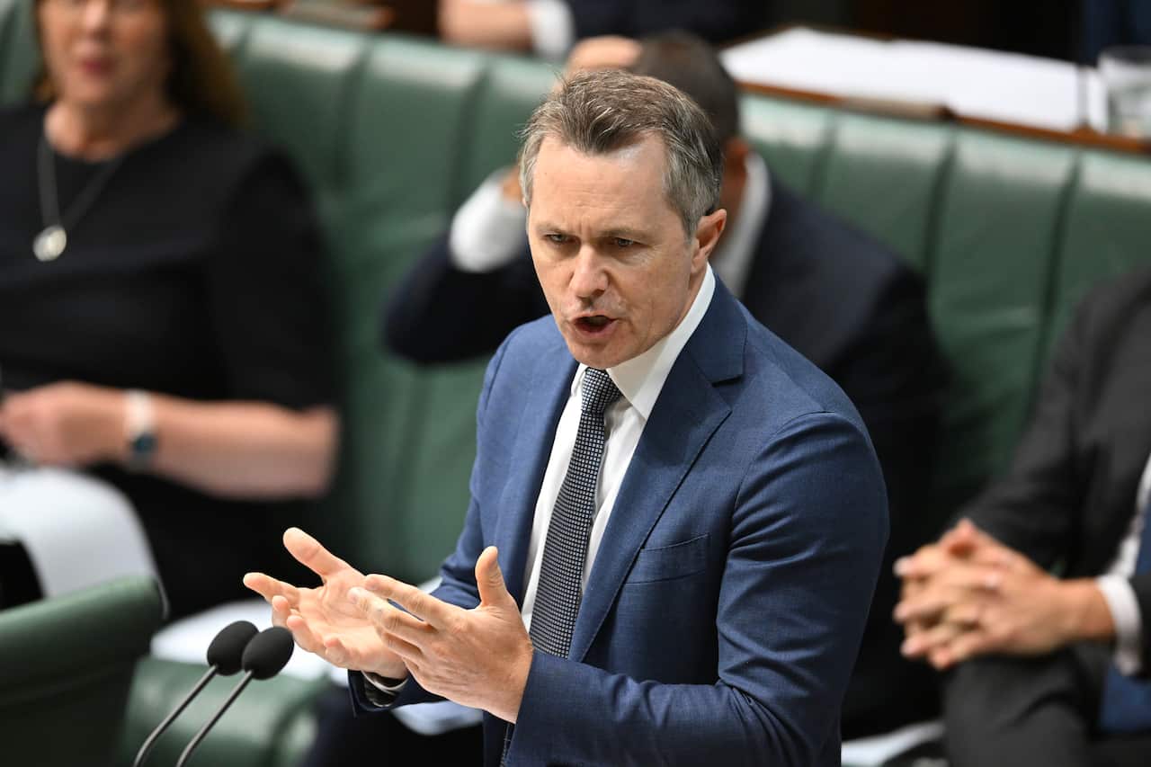 A man speaking during question time at parliament house