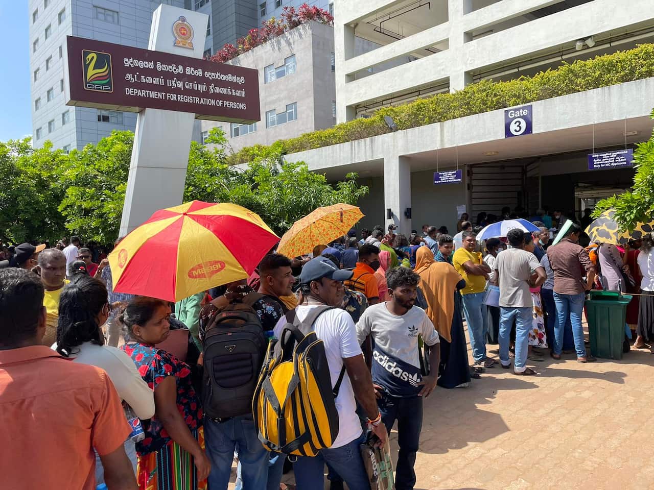 People are queuing for hours to get a passport.