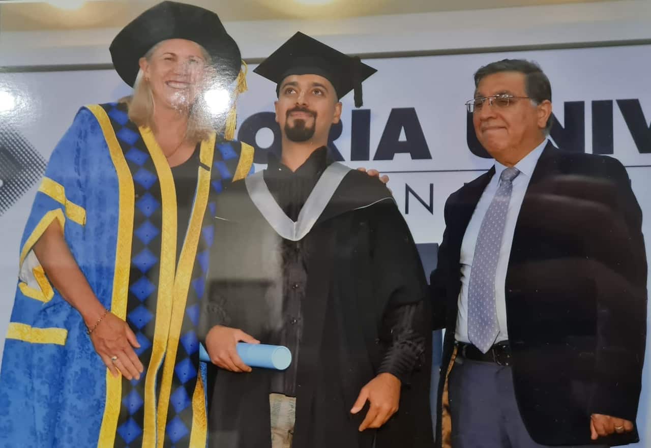 
AYMAN KHAIRI ALSAAD  GRADUATION.JPG