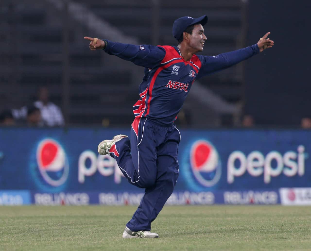 Sompal Kami celebrates taking a catch during the Afghanistan v Nepal match at the ICC World Twenty20 Bangladesh 2014 played at Zahur Ahmed Chowdhury Stadium on 20 March, 2014 in Chittagong, Bangladesh.