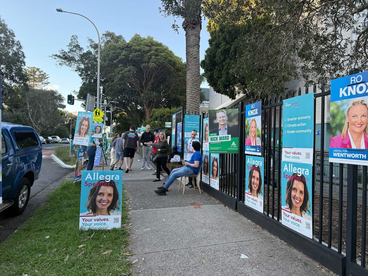 Pictures of voting posters outside a polling centre