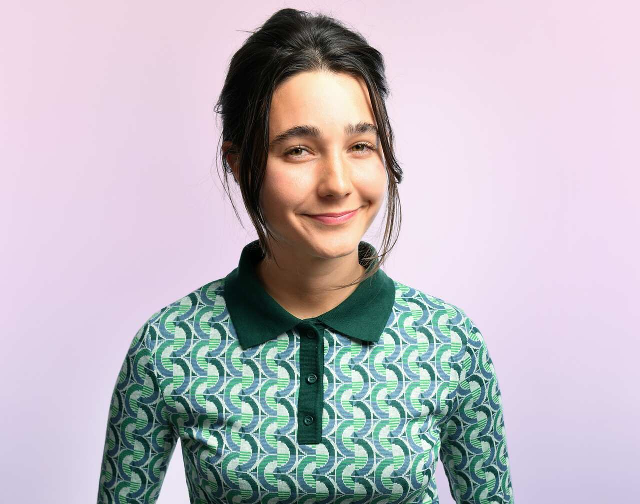 A woman winks at the camera