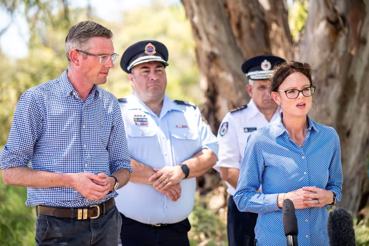 NSW Premier Dominic Perrottet (left) looks on as NSW Minister for Emergency Services and Resilience Steph Cooke speaks to media during a press conference in Menindee, NSW, Saturday, January 7, 2023.