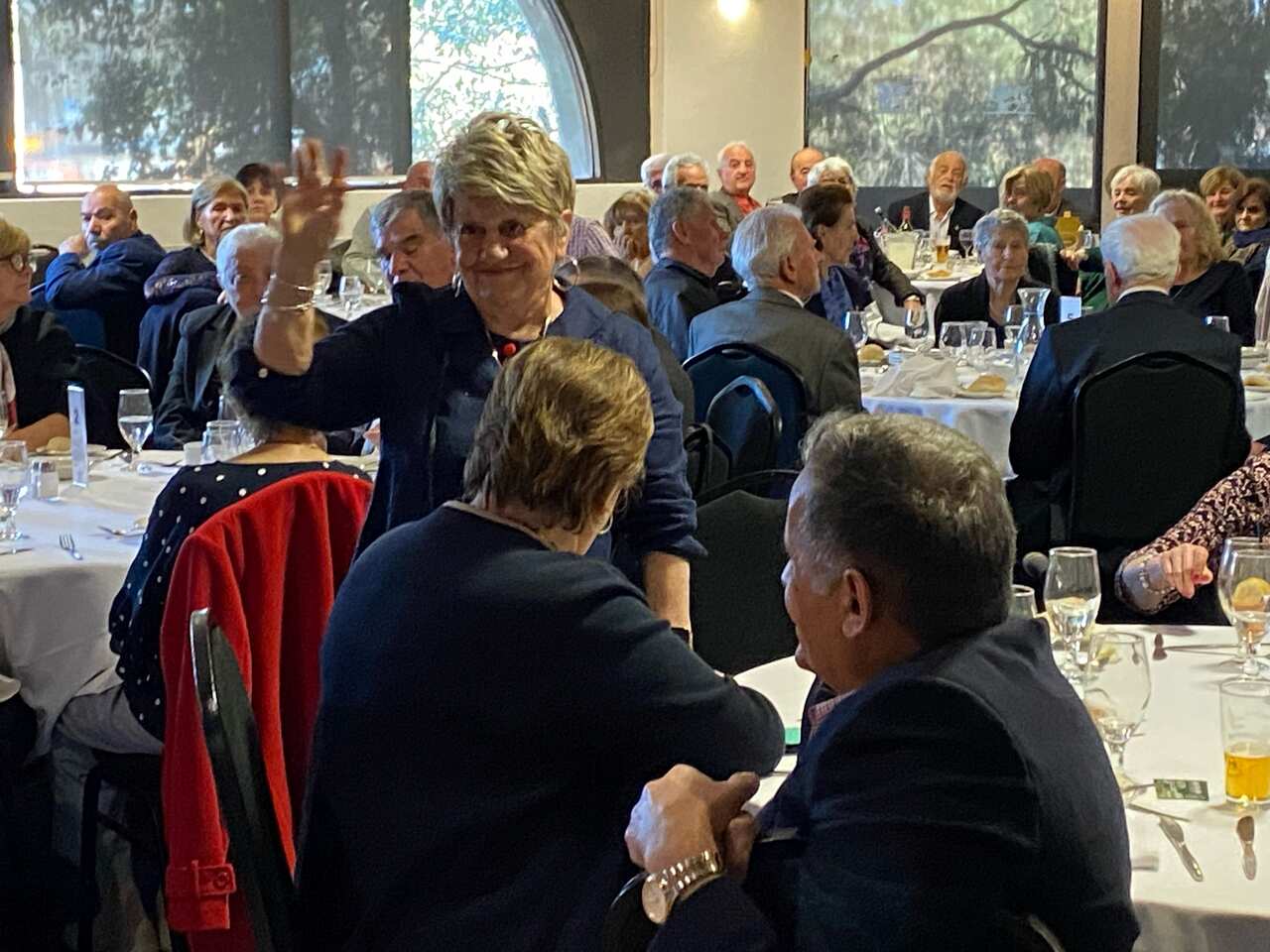 Lady standing at table- ILINDEN.jpg