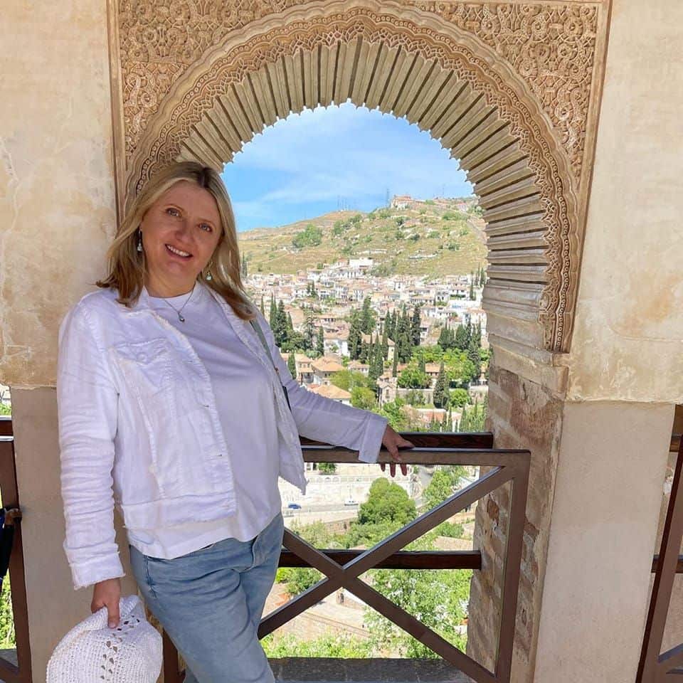 A woman posing for a photo.