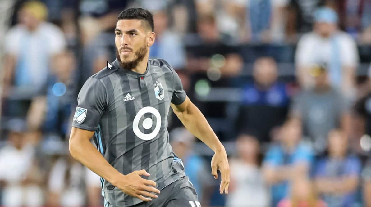 A man in a football field.