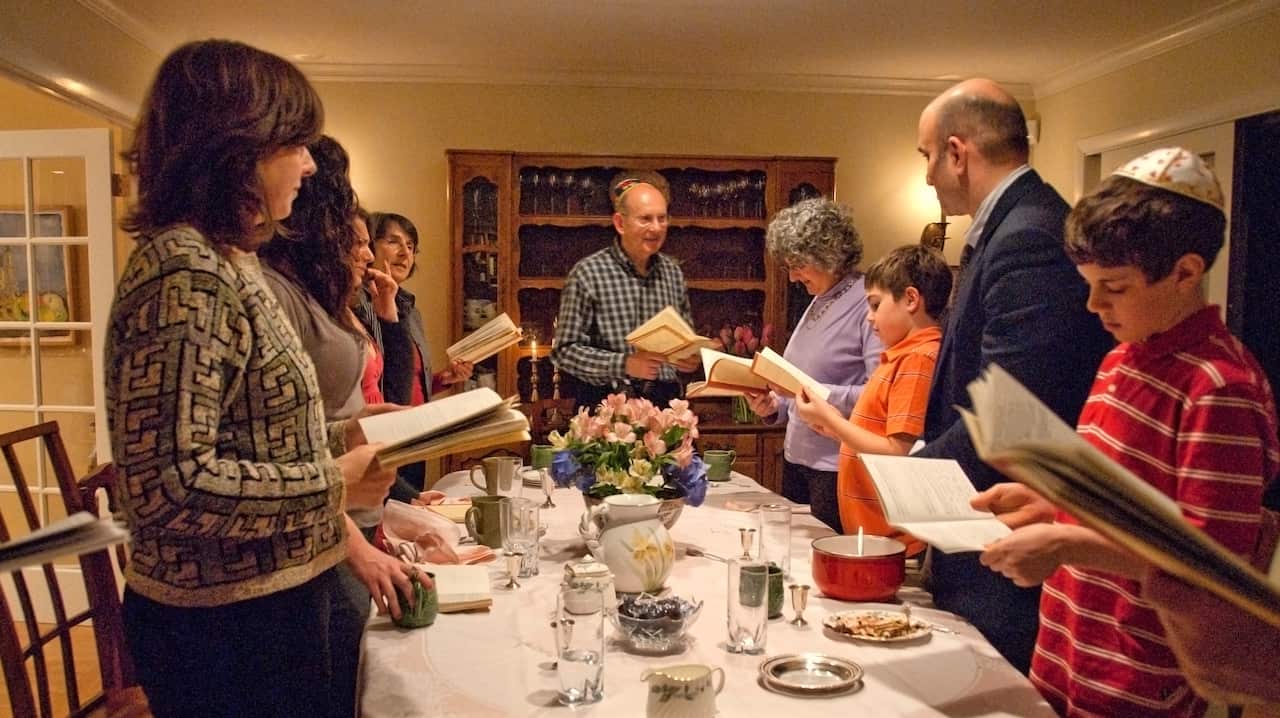 A family celebrate Passover dinner