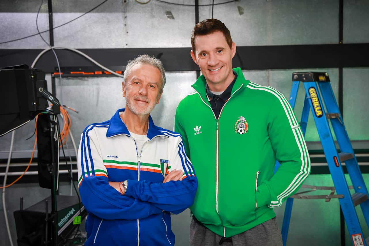Santo Cilauro and Ed Kavalee on the set of 'Cup Fever!'.