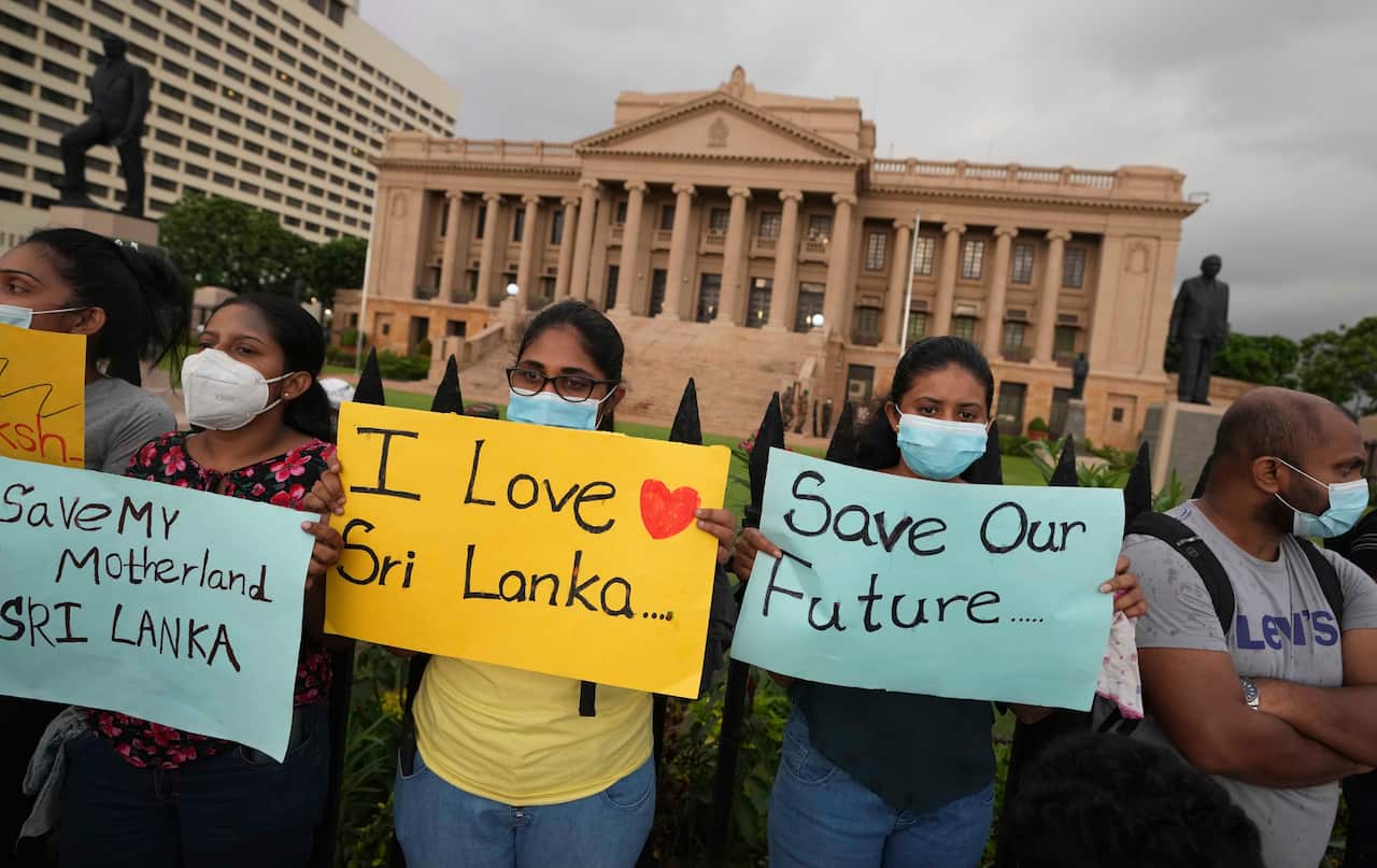 Sri Lankans protest outside the president's office in Colombo, Sri Lanka, Saturday, April 9, 2022.