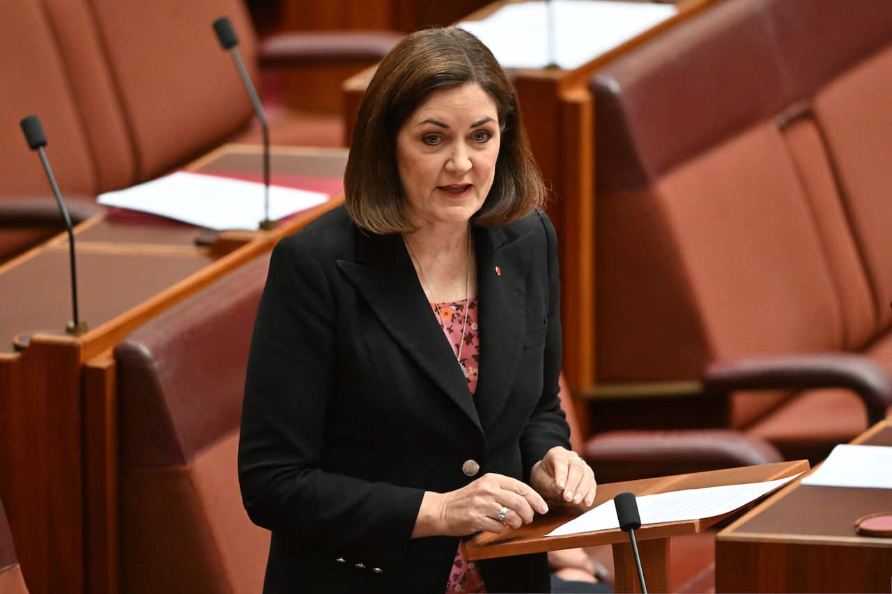 Woman speaks in the Senate.
