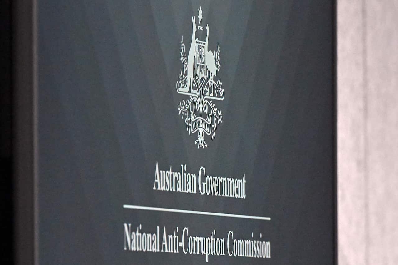 A sign that reads: "Australian Government: National Anti-Corruption Commission"