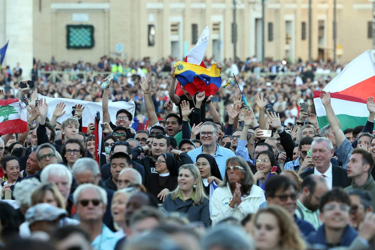 Crowds celebrate the appointment of Pope Leo XIV, Robert Prevost at the Vatican.