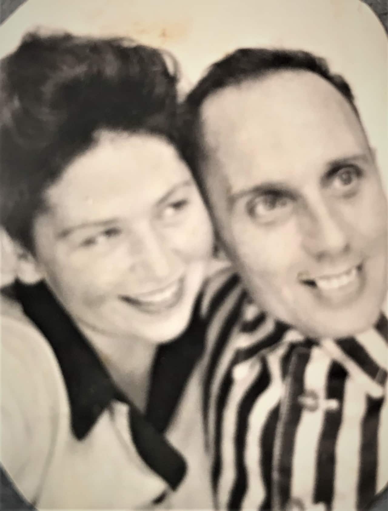 A black and white photo of a couple.