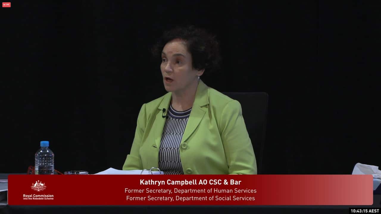 Woman in lime green jacket.