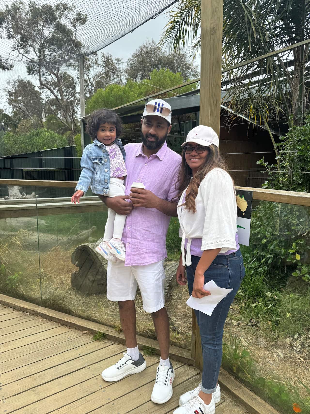 (Right to Left:) Vino Manisekaran (mum, 37), Beejay Permalla (dad, 41), and their daughter, liver transplant recipient Jhanvi Beejay, now 3 years old