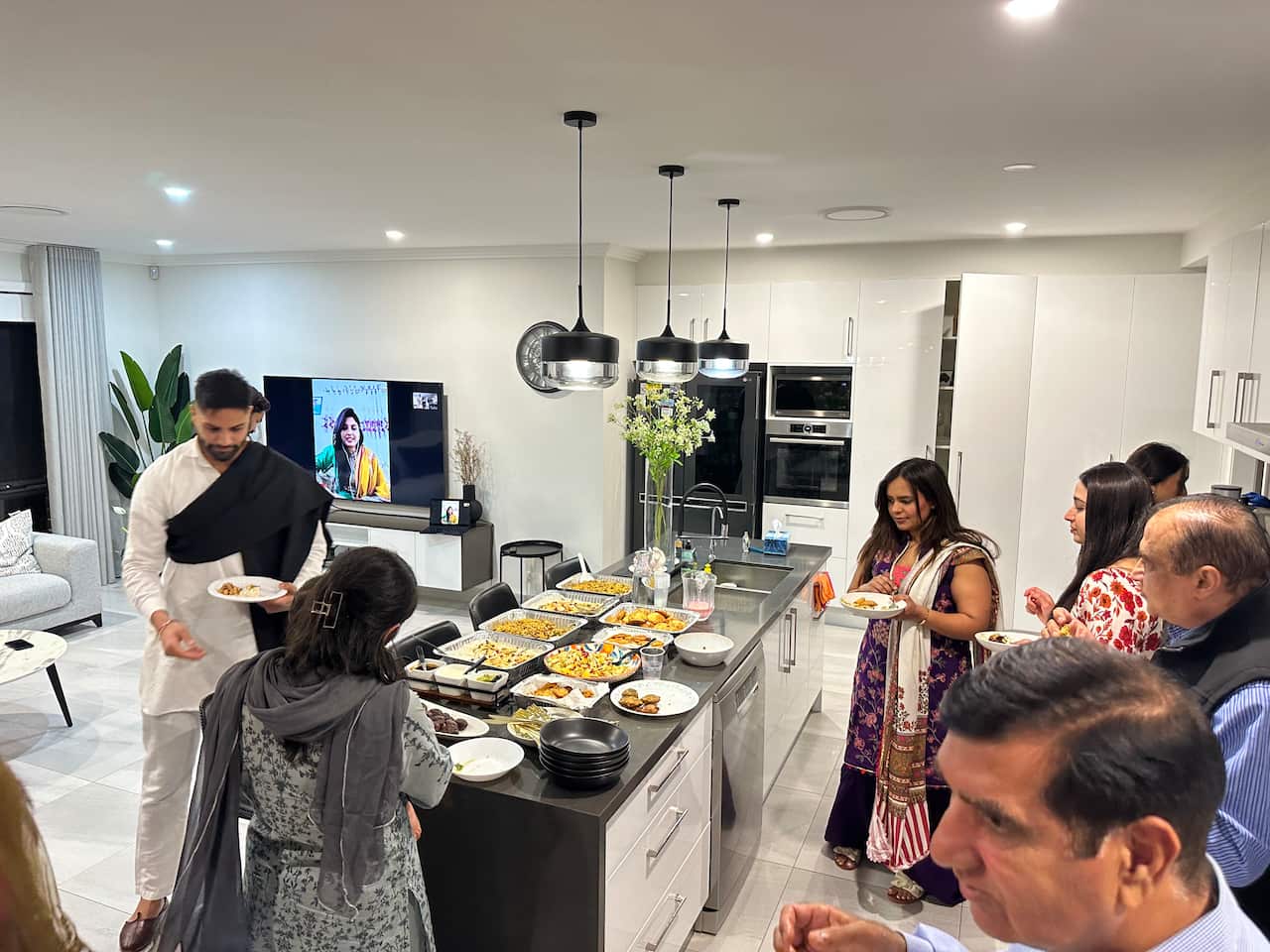 The guests enjoyed the traditional iftar served at Mr. Paul's place.