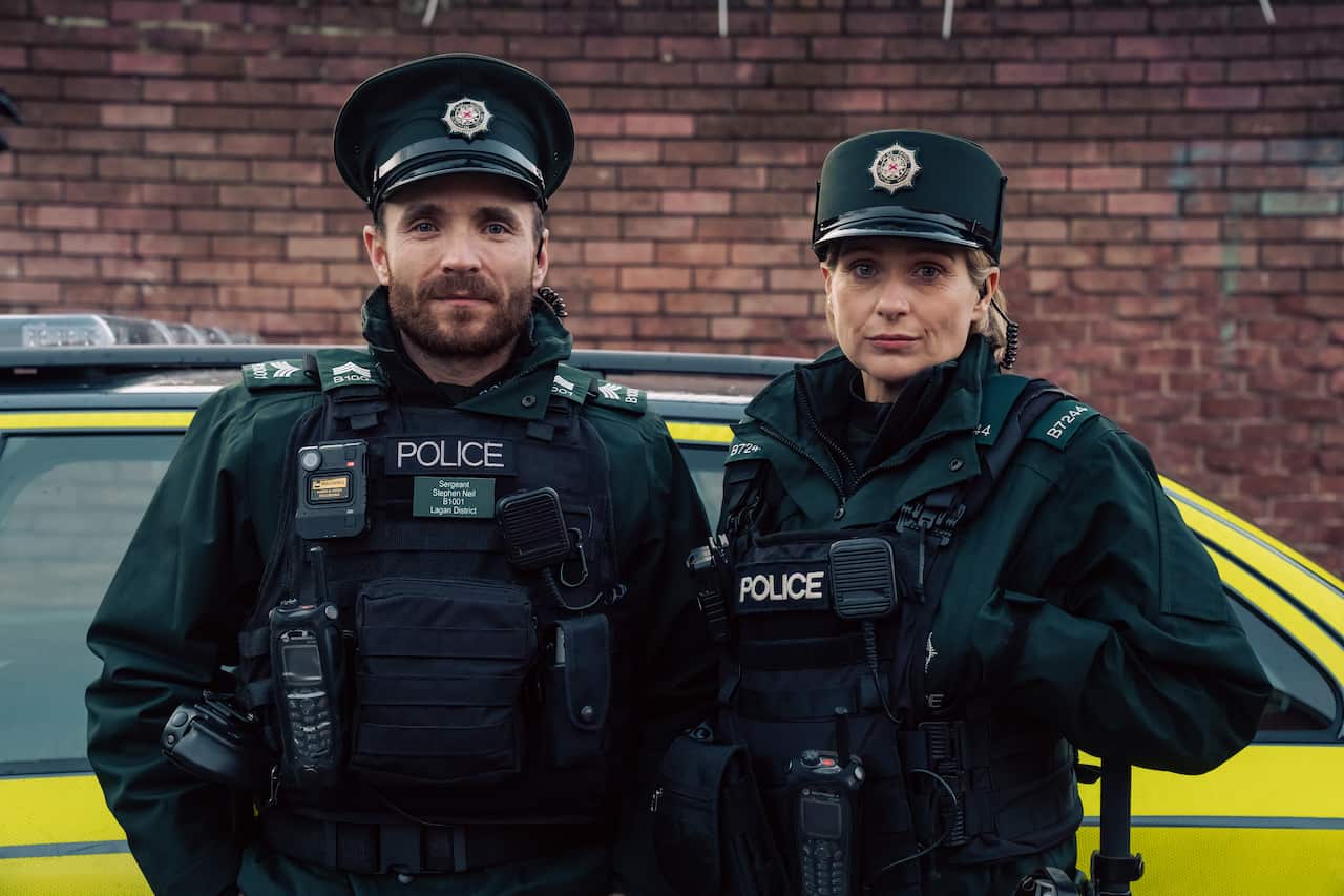 Martin McCann as Sergeant Stevie Neil and Siân Brooke as Constable Grace Ellis in 'Blue Lights' season 4.