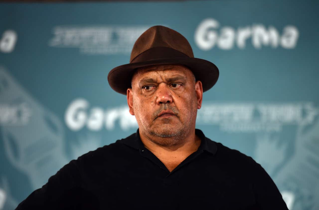 Noel Pearson pictured wearing a hat and looking serious