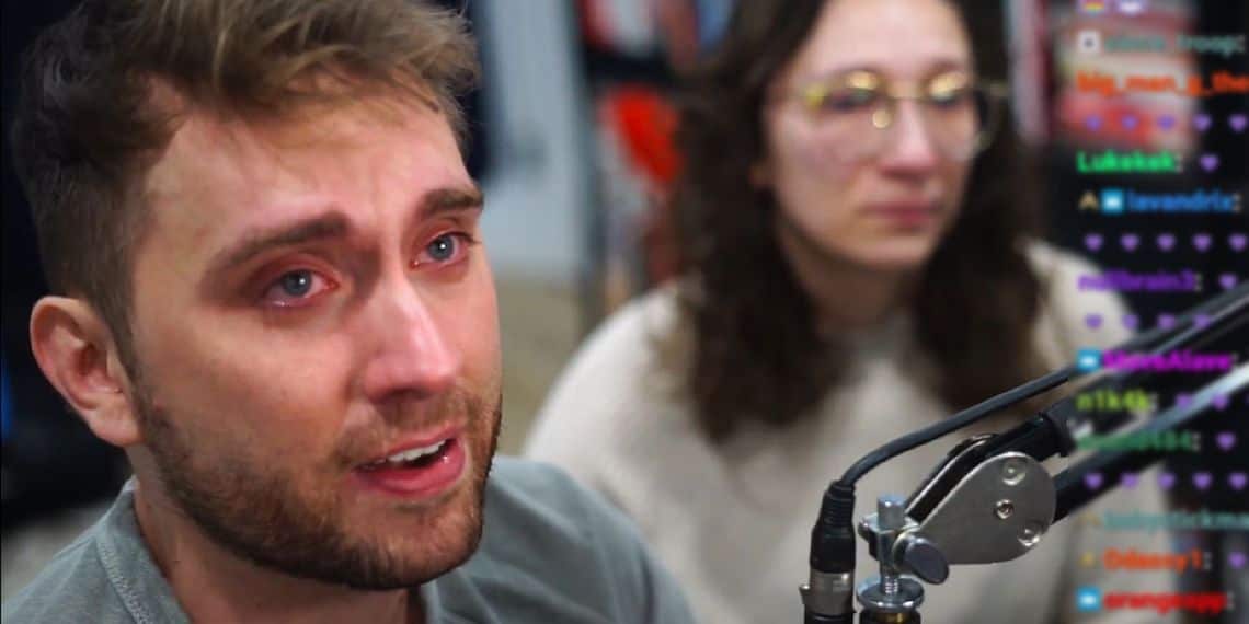 A man weeps on screen. 